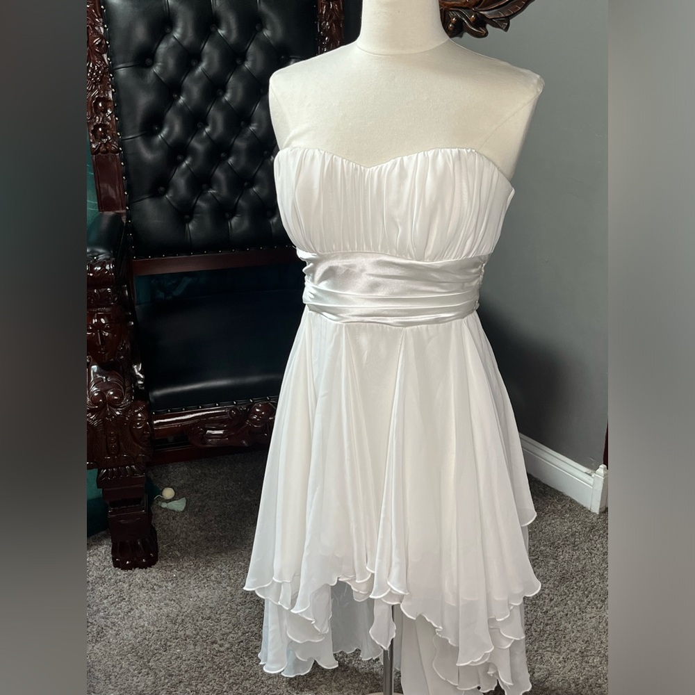 White strapless dress with handkerchief hem